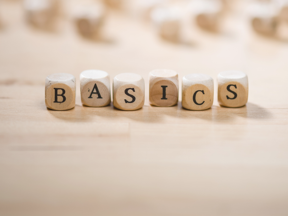 Wooden blocks spelling out the word, "basics."