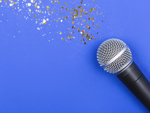 Microphone on a sparkly background.