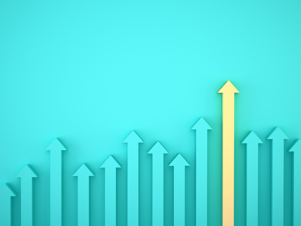 a teal background with teal arrows pointing up and one yellow arrow facing up.