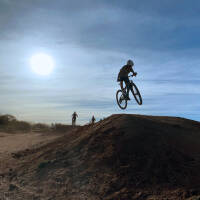 Benson MTB kid riding bike jumping dirt hill